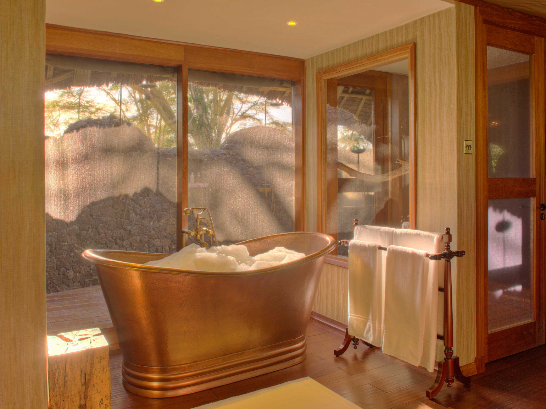 https://images.mrandmrssmith.com/images/1736x1302/6626629-luxury-tented-suite-bathroom-2-.jpg